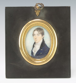 An early 19th Century oval miniature watercolour on ivory of a gentleman wearing a blue jacket, the reverse with in memorium hair locket 8cm x 6cm