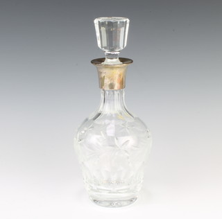 A mallet shaped cut glass decanter with silver collar, London 1990, 29cm 