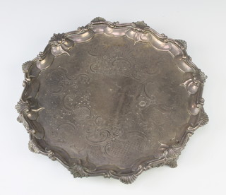 A George III silver salver with shell rim and chased scroll and floral decoration London 1818, 492 grams 28 cm