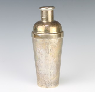 A silver cocktail shaker of tapered form London 1928, 21cm, 426 grams