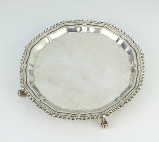 A silver card tray with Chippendale style rim on scroll feet Birmingham 1972 93 grams 15cm 