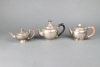A silver baluster batchelor's teapot with fruitwood handles, Sheffield 1937, 2 other teapots
