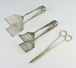 A pair of silver handled scissors London 1961 and 2 pairs of silver servers 