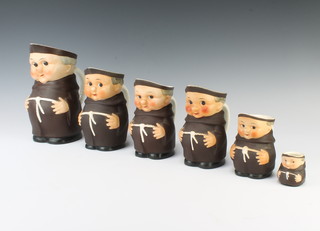 A Goebel monk jug S141/3 21cm, a do. S141/11 16cm, a pair S141/1 15cm, another S141/0 and another 5cm 