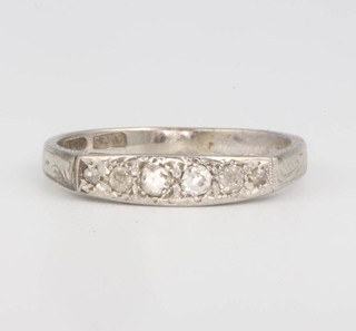 An 18ct white gold 6 stone diamond ring size P 1/2 