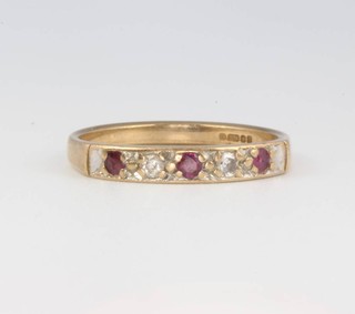 A 9ct yellow gold ruby and diamond ring size P