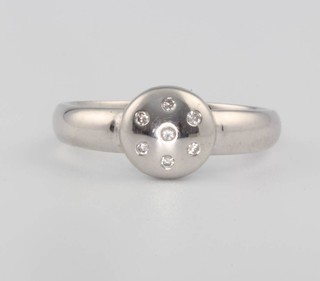 An 18ct white gold diamond bombe shape ring size M 1/2