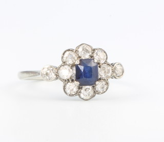 An 18ct white gold Edwardian style sapphire and diamond cluster ring size O 
