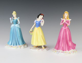 Three Royal Doulton figures Sleeping Beauty DP2 18cm, Snow White DP5 17cm and Cinderella DP1 17cm 