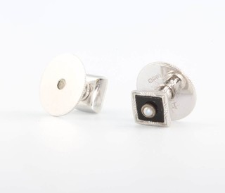 A pair of 9ct white gold pearl and onyx studs in a Garrards box 