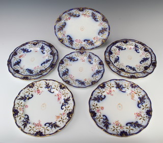 A 19th Century Davenport part dessert service comprising oval serving plate, 3 medium plates and 4 dinner plates enclosing an armorial