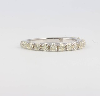 A 9ct yellow gold diamond set half eternity ring 0.77ct, size L 1/2