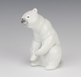 A Lladro figure of a seated polar bear 12cm 