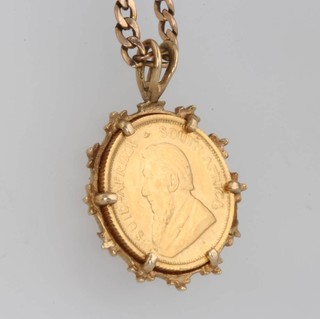 A 1980 one tenth Krugerrand on a 9ct chain, gross 6.5 grams