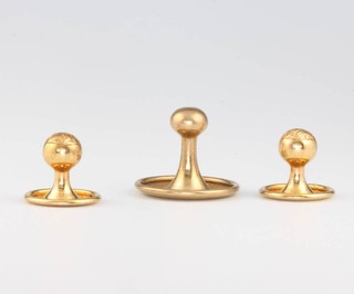 Two 15ct gold studs 1.3 grams, a 9ct fob and stud 3.7 grams 
