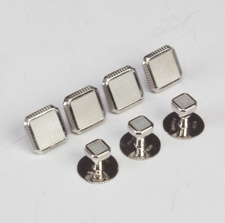 A set of seven 9ct white gold dress studs 7.5 grams