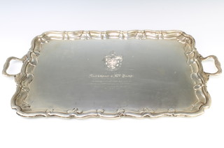 A silver 2 handled rectangular tray with pie crust rim and chased armorial maker Stevenson & Law Sheffield 1916, 73cm, 160 ozs 