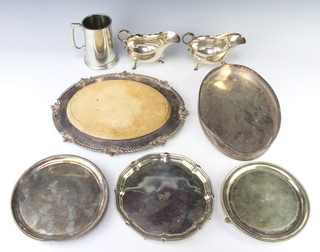A 19th Century silver plated card tray on claw and ball feet 18cm, 2 others, a bread board base and minor plated items