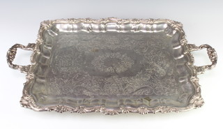 A silver plated 2 handled tray with scroll decoration 63cm 