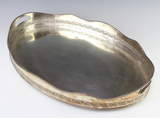 An oval silver plated 2 handled galleried tray 51cm 