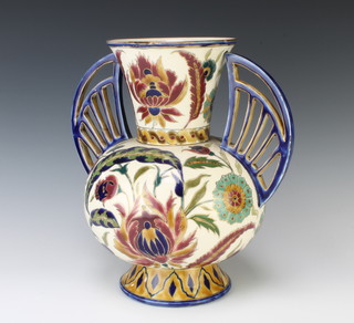 A Zsolnay twin handled vase with pierced handles and stylised floral decoration 32cm 