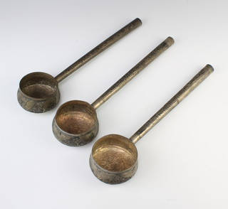 Three Indian silver repousse ladles decorated with beasts, 370 grams 