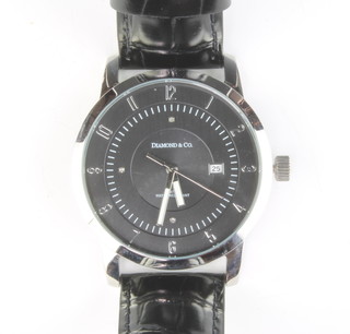A gentleman's steel cased Diamond & Co calendar wristwatch, with diamond set dial on a black leather strap, boxed 