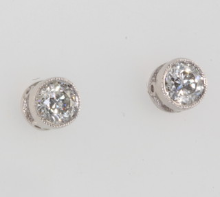 A pair of 18ct white gold single stone diamond ear studs approx. 0.4ct