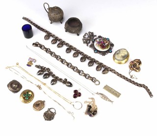 A silver brooch, a gilt metal and enamelled locket and minor silver and gilt costume jewellery 