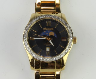 A gentleman's gilt cased Ingersoll moon phase calendar wristwatch on a gilt bracelet, boxed