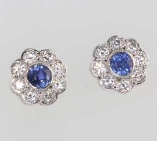 A pair of 18ct white gold sapphire and diamond ear studs, the sapphires approx. 0.5ct, the brilliant cut diamonds approx. 0.75ct 