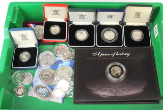 Twenty one proof silver coins in unopened cases