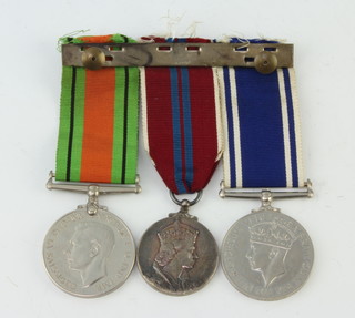 A medal group to Inspector Alfred G Pennicott comprising Defence medal, 1953 Coronation medal and a Police Long Service and Good Conduct medal 
