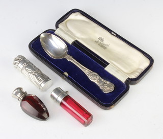 An Edwardian repousse silver scent bottle 8cm (no stopper) 2 mounted glass scents and a cased spoon