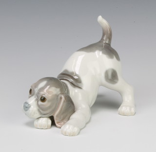 A Lladro figure of a puppy 15cm 