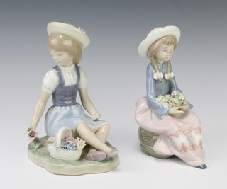 A Lladro figure of a seated girl with a lap of flowers 5554 15cm together with a do. of a seated girl with basket of flowers 16cm 