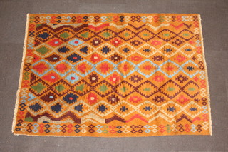 A brown and green ground Belouch rug with all over geometric design 182cm x 127cm 