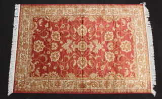 A gold and red ground Belgium cotton Ziegler rug 190cm x 140cm 