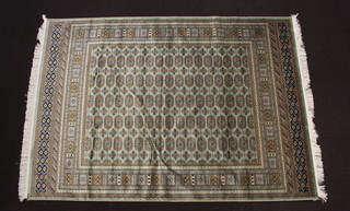 A green ground Belgium cotton Bokhara carpet 230cm x 160cm 