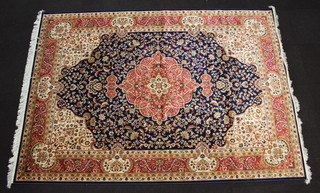 A blue and gold ground Belgium cotton Kashan carpet with central medallion 280cm x 200cm 