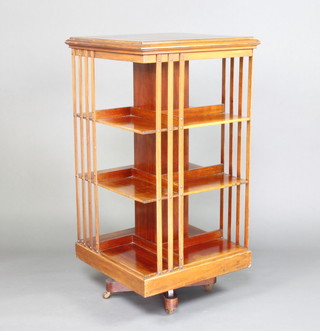 An Edwardian square mahogany 3 tier revolving bookcase 120cm h x 60cm x 61cm 