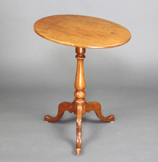 A Victorian oval bleached mahogany snap top wine table raised on a pillar and tripod base 68cm x 66cm x 44cm d 