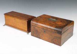 A Victorian figured walnut D shaped trinket box with hinged lid, the interior with fitted tray 14cm x 30cm x 21cm together with a rectangular figured walnut trinket box with quarter veneered top raised on paw feet 13cm x 32cm x 13cm 