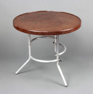 Mahbro Ltd, a circular Art Deco polished Bakelite coffee table raised on tubular chrome supports 52cm x 60cm diam. 