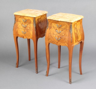 A pair of French inlaid kingwood bedside chests of bombe form with pink veined marble top, fitted 3 long drawers raised on cabriole supports 71cm h x 35cm w x 29cm d 
