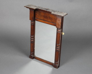 A rectangular plate pier mirror contained in a mahogany frame with shaped cornice, having columns to the sides 56cm x 41cm 