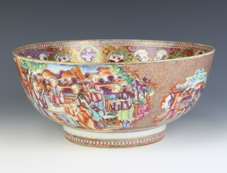 An 18th Century famille rose Chinese export bowl, the interior decorated with figures on a pavilion terrace surrounded by vignettes the exterior with figures of pursuits on pavilion terraces 29cm diam. 