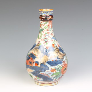 A 19th Century Imari bottle vase decorated with an extensive landscape with butterflies, insects and figures 22cm