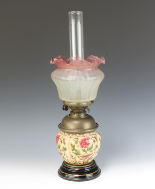 An Edwardian ceramic baluster oil lamp with a later 2 colour shade and clear glass chimney 58cm 