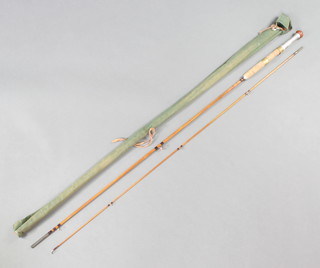 A Lindop 2 piece 8' split cane fly fishing rod in a green cloth bag